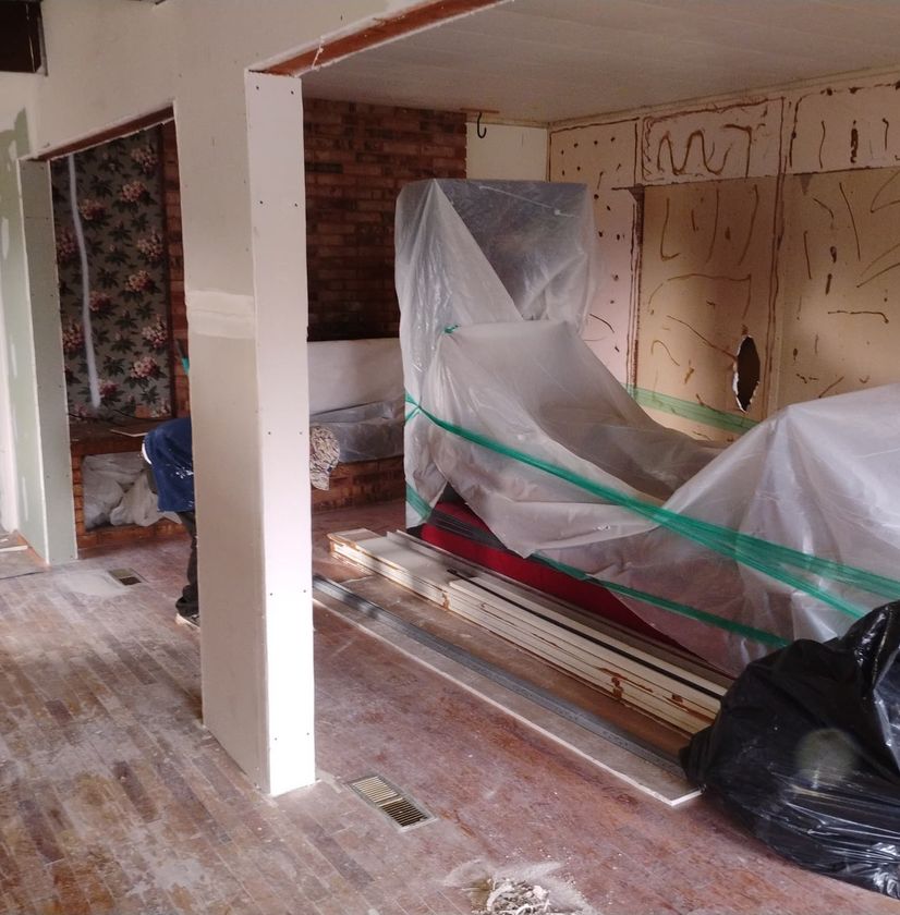 Home remodeling project with walls opened for renovation