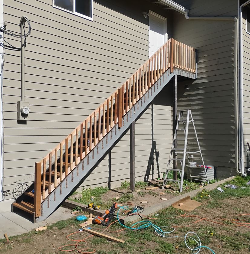 Exterior wooden staircase construction and yard renovation